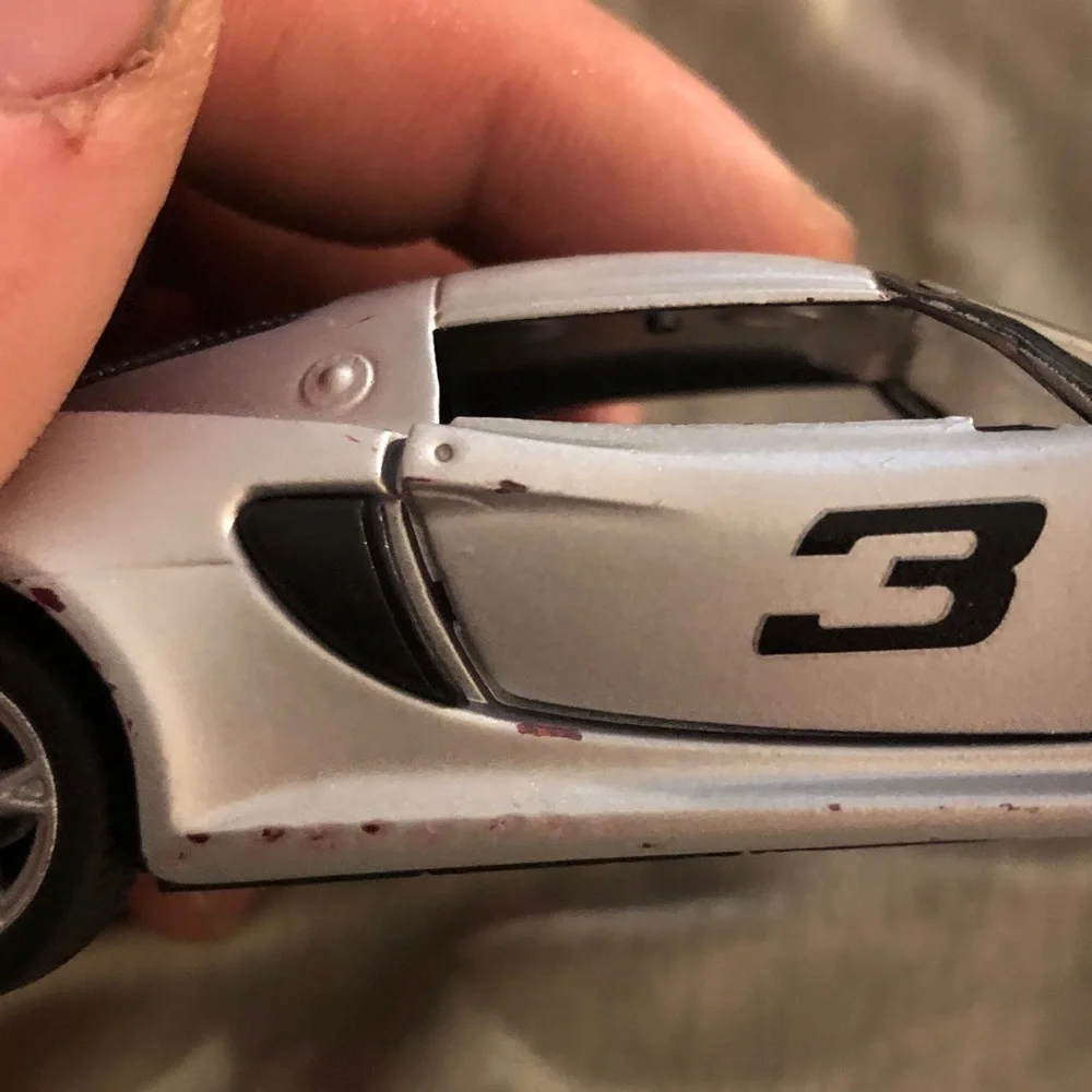 Red and Silver Lotus Exige S pull back action.